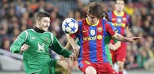 Leo Messi (a destra) durante Bara-Rubin. Ansa
