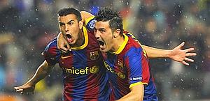 Pedro e Villa festeggiano il gol del Bara. Afp