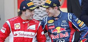 Alonso e Vettel contenti sul podio. Ap