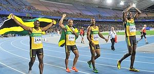Festa Giamaica dopo l'oro nella 4x100. Afp