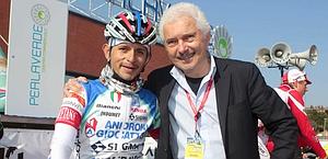 Savio con Rujano, vincitore sul GlossGlockner al Giro '11. Bettini