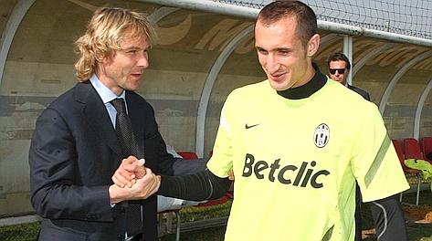 Giorgio Chiellini (destra) insieme a Pavel Nedved. Lapresse