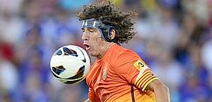 Carles Puyol poco prima dell'infortunio nella gara col Levante. Afp