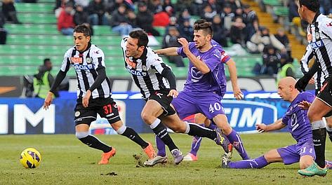 Domizzi toccato da Migliaccio: rigore, ma il difensore dell'Udinese era in fuorigioco. LaPresse