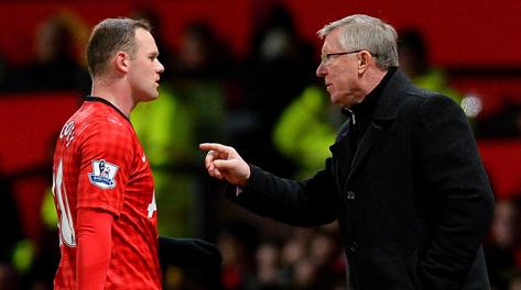Alex Ferguson richiama Wayne Rooney. Afp