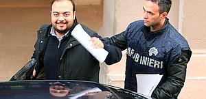 L'arresto di Giuseppe Postiglione, ex presidente del Potenza. Ansa L'arresto di Giuseppe Postiglione, ex presidente del Potenza. Ansa