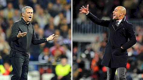 Jos Mourinho, 49 anni, e Pep Guardiola, 41. Afp