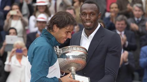 Usain Bolt premia il vincitore di Parigi, Rafa Nadal. Usa Today