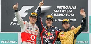 Il podio di Sepang: Button, Vettel e Heidfeld. Reuters