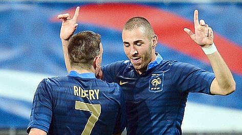 L'esultanza di Karim Benzema e Franck Ribery. Afp