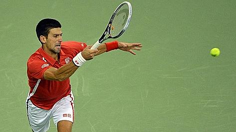 Novak Djokovic , 25 anni, colpisce di dritto. Afp