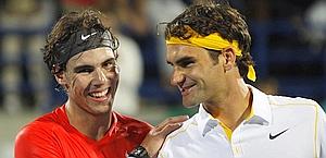 Nadal e Federer, finalisti 2011 ad Abu Dhabi. Reuters