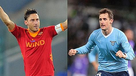 Francesco Totti, 35 anni, e Miroslav Klose, 33 anni. Ansa-Eidon