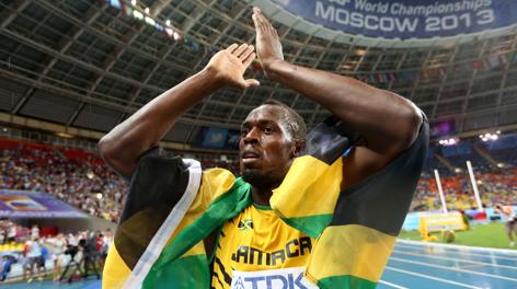 Usain Bolt dopo aver vinto l'oro iridato nei 100 metri. Afp