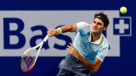 Federer in azione contro Mannarino. Afp