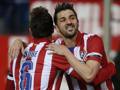 Villa festeggia con Koke il gol dell'Atletico. Reuters