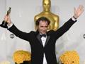 Paolo Sorrentino col premio Oscar vinto per 