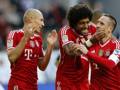 Dante e Robben festeggiano Ribery. Reuters