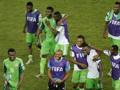 Nigeriani in festa dopo l'1-0 sulla Bosnia. LaPresse