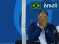 Felipe Scolari non vuole guardare il massacro del suo Brasile. Reuters