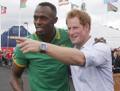 Usain St. Leo Bolt, 27 anni, con il principe Harry ai Giochi del Commonwealth. Ap