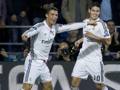 Ronaldo festeggia con James Rodriguez la doppietta al Siviglia. LaPresse