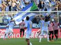 La gioia di Luis Alberto e di tutto il Malaga dopo la rete dell’1-0. Afp