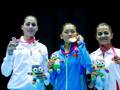 Irma Testa con l'oro cinese Yuan Chang e la turca Neriman Istik , medaglia di bronzo. Getty