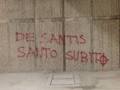 La scritta apparsa sotto il ponte della Musica a Roma. 