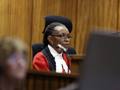 Il giudice Thokozile Masipa legge la sentenza di omicidio colposo per Pistorius. Reuters
