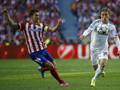 Gabi, 31 anni, con la maglia dell'Atletico Madrid, in azione contro il Real. Reuters