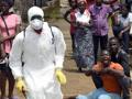 Scene in Liberia durante l'epidemia di Ebola. Afp