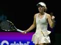 Caroline Wozniacki in campo alle Wta Finals. Getty Images