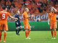 Huntelaar, Robben, e Blind reagiscono a un gol del Messico. Action 