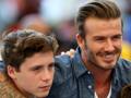 David Beckham (a destra) con il figlio Brooklyn. Getty