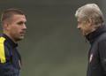 Lukas Podolski, 29 anni, e Arsene Wenger, 65. Archivio