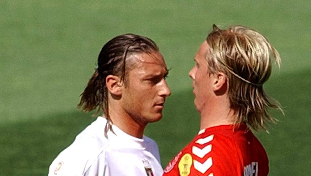 Christian Poulsen con Francesco Totti  