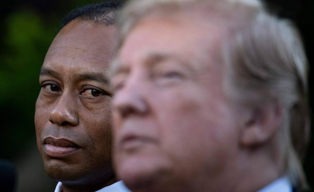 Tiger Woods e Donald Trump. Afp 
