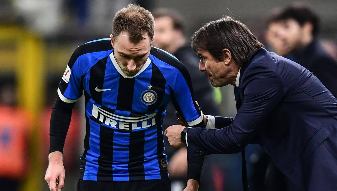 Christen Eriksen con Antonio Conte. Afp 