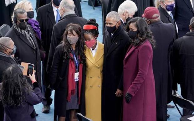 Amanda Gorman with Mr. and Mrs. Obama at Inauguration Day. Epa