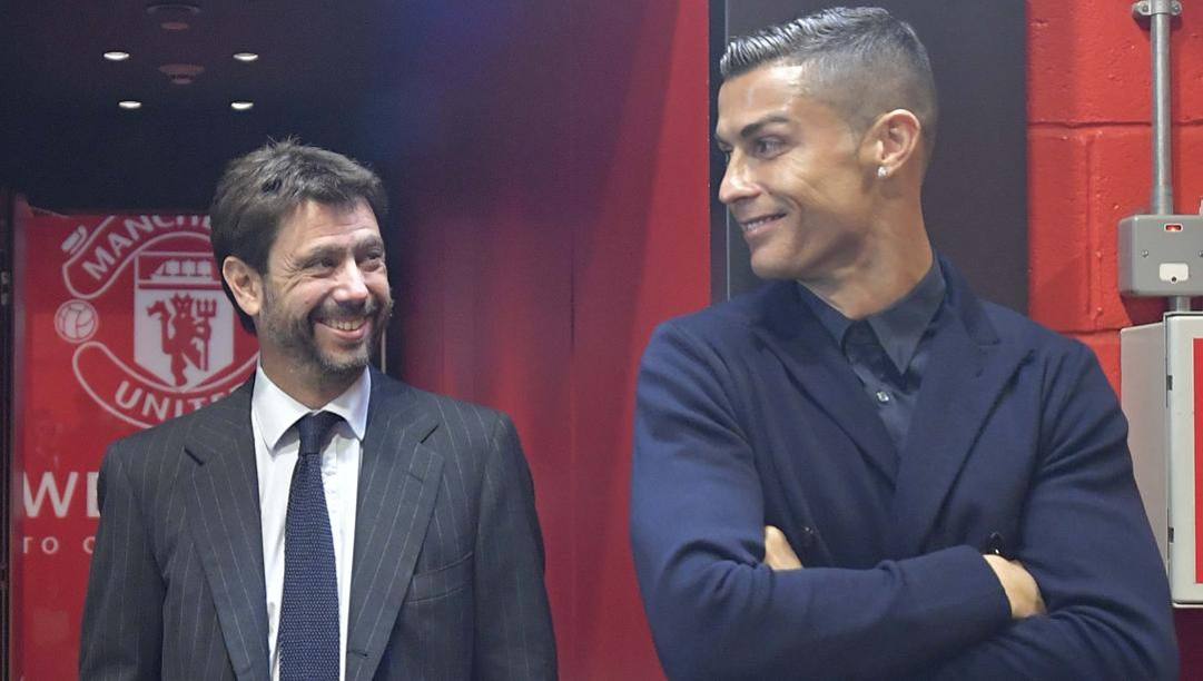 Cristiano Ronaldo con il presidente Andrea Agnelli. Getty 