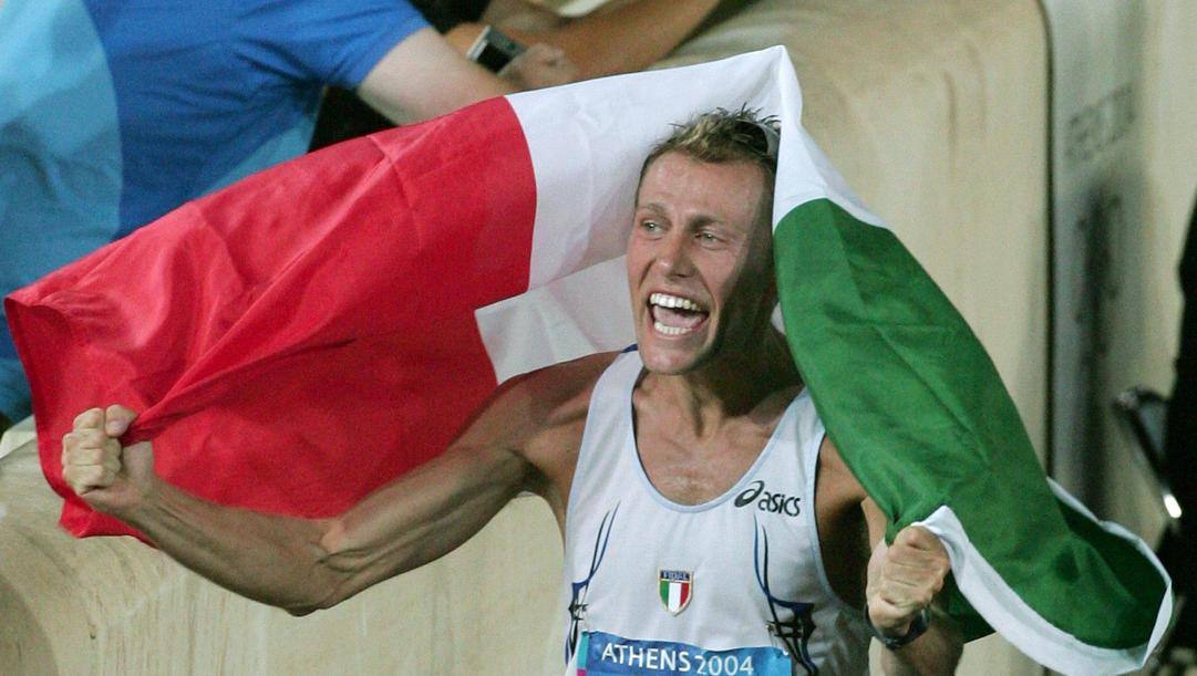 Stefano Baldini trionfatore all'Olimpiade di Atene 2004. Ap 