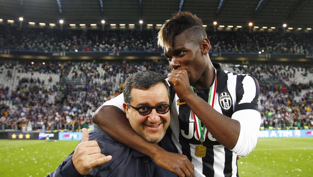 L'agente Mino Raiola con Paul Pogba, ai tempi in cui il francese giocava nella Juventus. Lapresse 