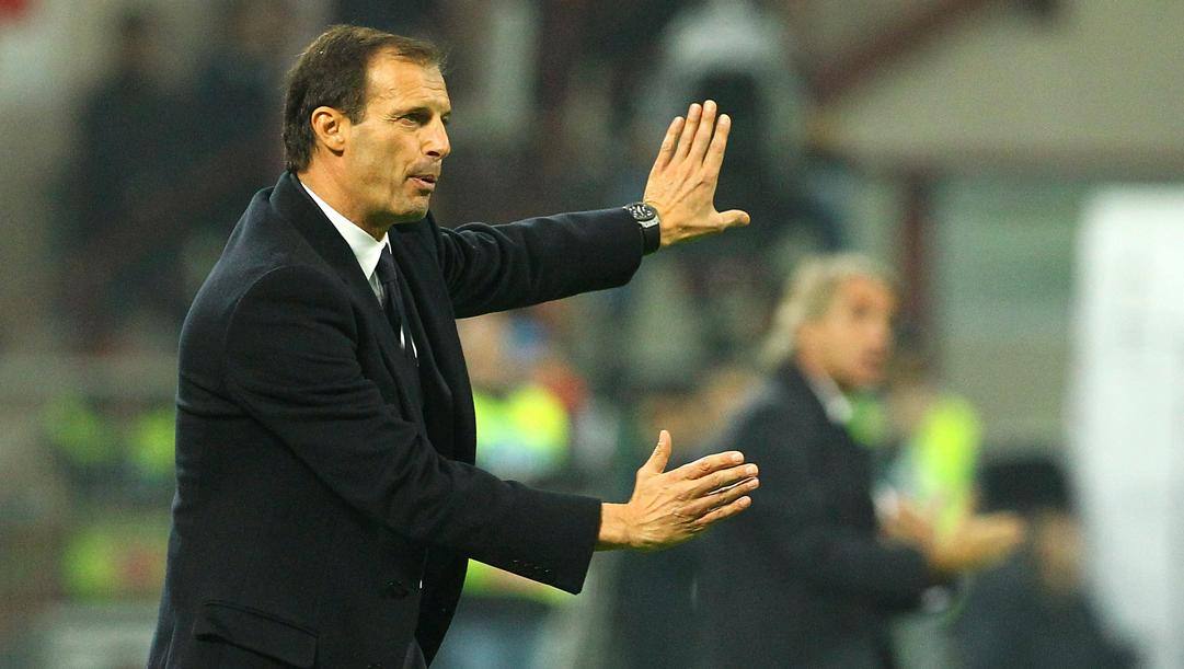 Max Allegri. Sullo sfondo Roberto Mancini GETTY 